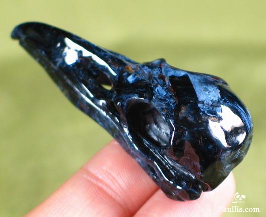 Blue, Gold & Red Pietersite Crystal Raven Skull