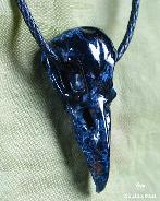 2.3" Blue, Gold & Red Pietersite Carved Crystal Raven Skull