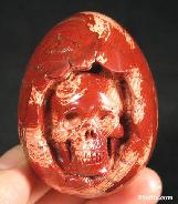 Red Striped Jasper Carved Crystal Red Skull in Egg