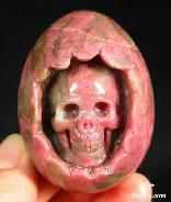Pink & White Rhodonite Carved Crystal Skull in Egg