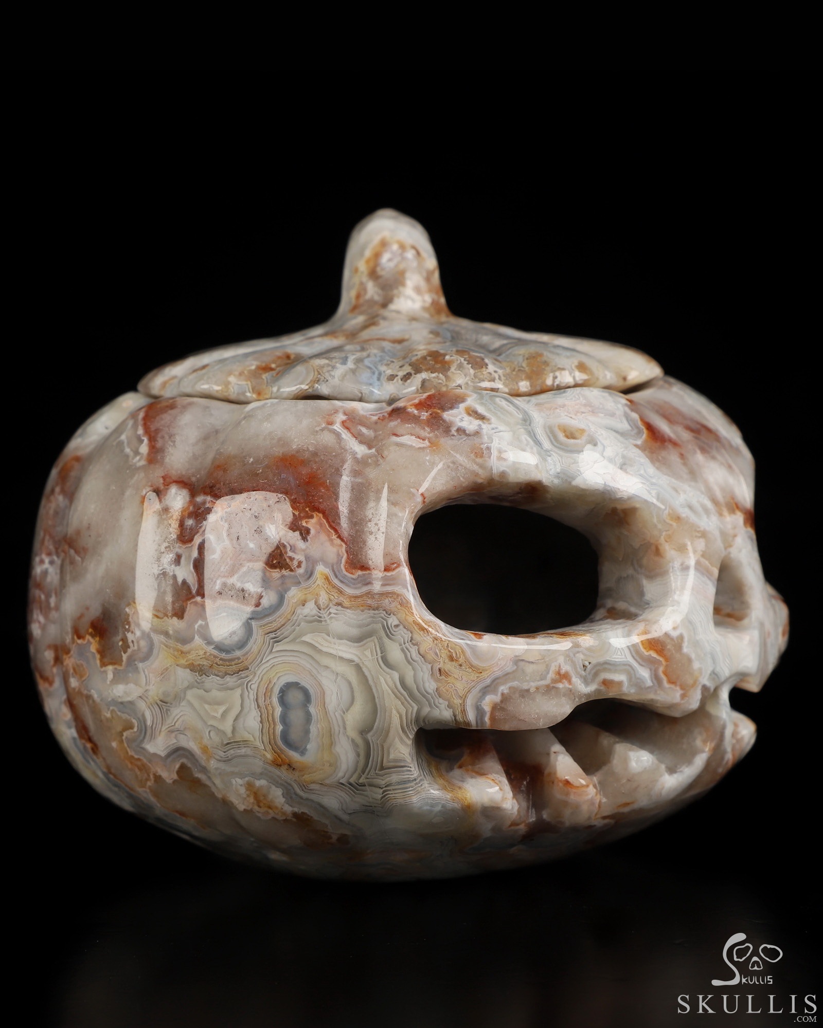 4.1" Red Crazy Lace Agate Hand Carved Hollow Jack-O'-Lantern Pumpkin Crystal Skull Sculpture 4.1" Red Crazy Lace Agate Hand Carved Hollow Jack-O'-Lantern Pumpkin Crystal Skull Sculpture