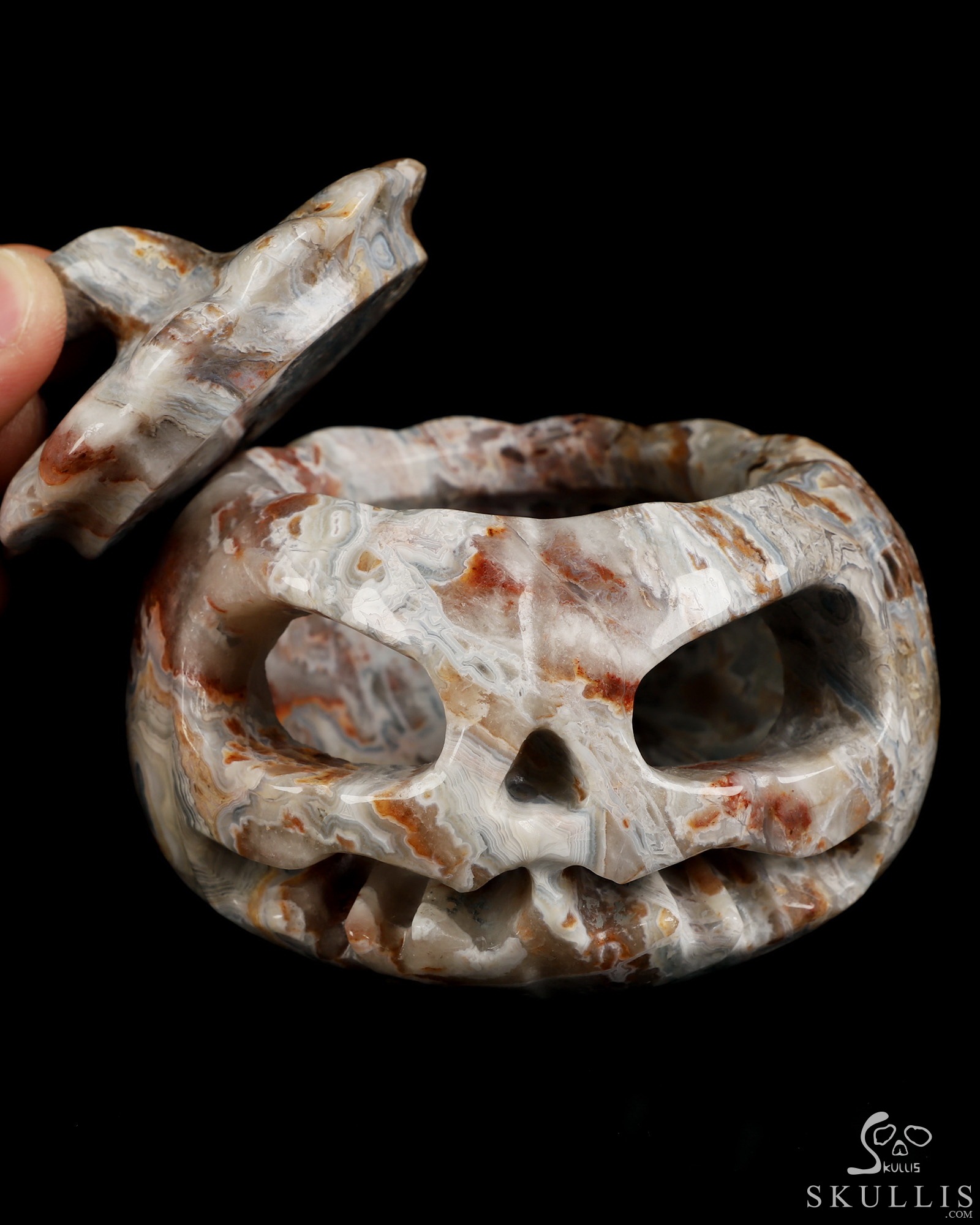 4.1" Red Crazy Lace Agate Hand Carved Hollow Jack-O'-Lantern Pumpkin Crystal Skull Sculpture 4.1" Red Crazy Lace Agate Hand Carved Hollow Jack-O'-Lantern Pumpkin Crystal Skull Sculpture