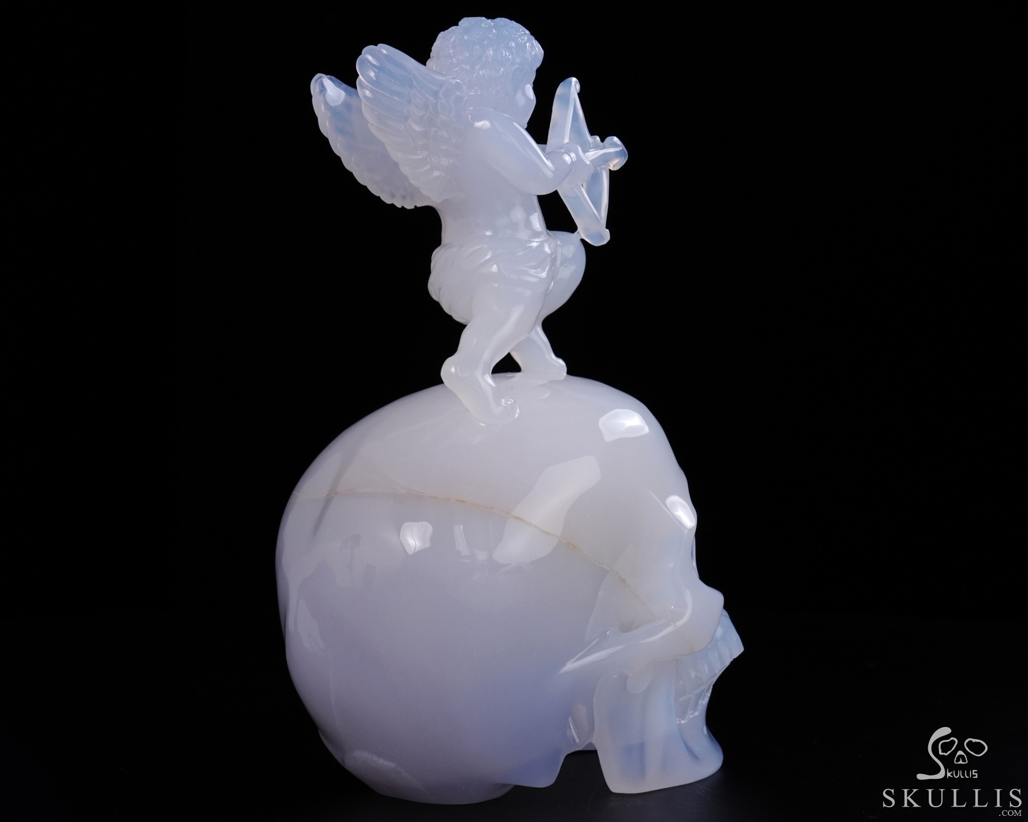June 4, 2026 ACSAD (A Crystal Skull a Day) - Aiming for Forever - 6.4" Blue Chalcedony Hand Carved Cupid on Crystal Skull Fine Art Sculpture, Crystal Healing June 4, 2026 ACSAD (A Crystal Skull a Day) - Aiming for Forever - 6.4" Blue Chalcedony Hand Carved Cupid on Crystal Skull Fine Art Sculpture, Crystal Healing