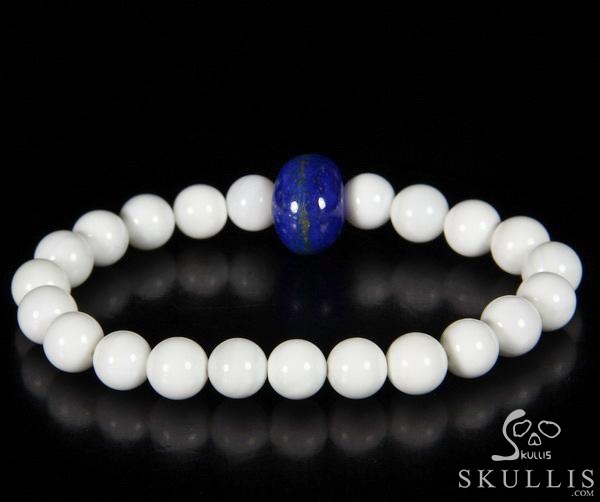 The Harmonious Pulse - Tridacna Gigas Beads Stretch Bracelet with Hand-Carved Lapis Lazuli Skull, Crystal Healing Skull Jewelry, for Women & Men The Harmonious Pulse - Tridacna Gigas Beads Stretch Bracelet with Hand-Carved Lapis Lazuli Skull, Crystal Healing Skull Jewelry, for Women & Men