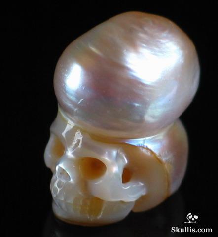 Skulls carved deals out of pearls