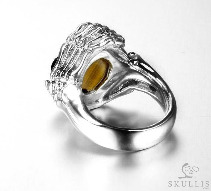 Embrace of Love - US size 9.5 Gold Tiger's Eye Hand Carved Skull with Skeletal Hands in Silver Ring, Crystal Healing Skull Jewelry, for Women & Men Embrace of Love - US size 9.5 Gold Tiger's Eye Hand Carved Skull with Skeletal Hands in Silver Ring, Crystal Healing Skull Jewelry, for Women & Men
