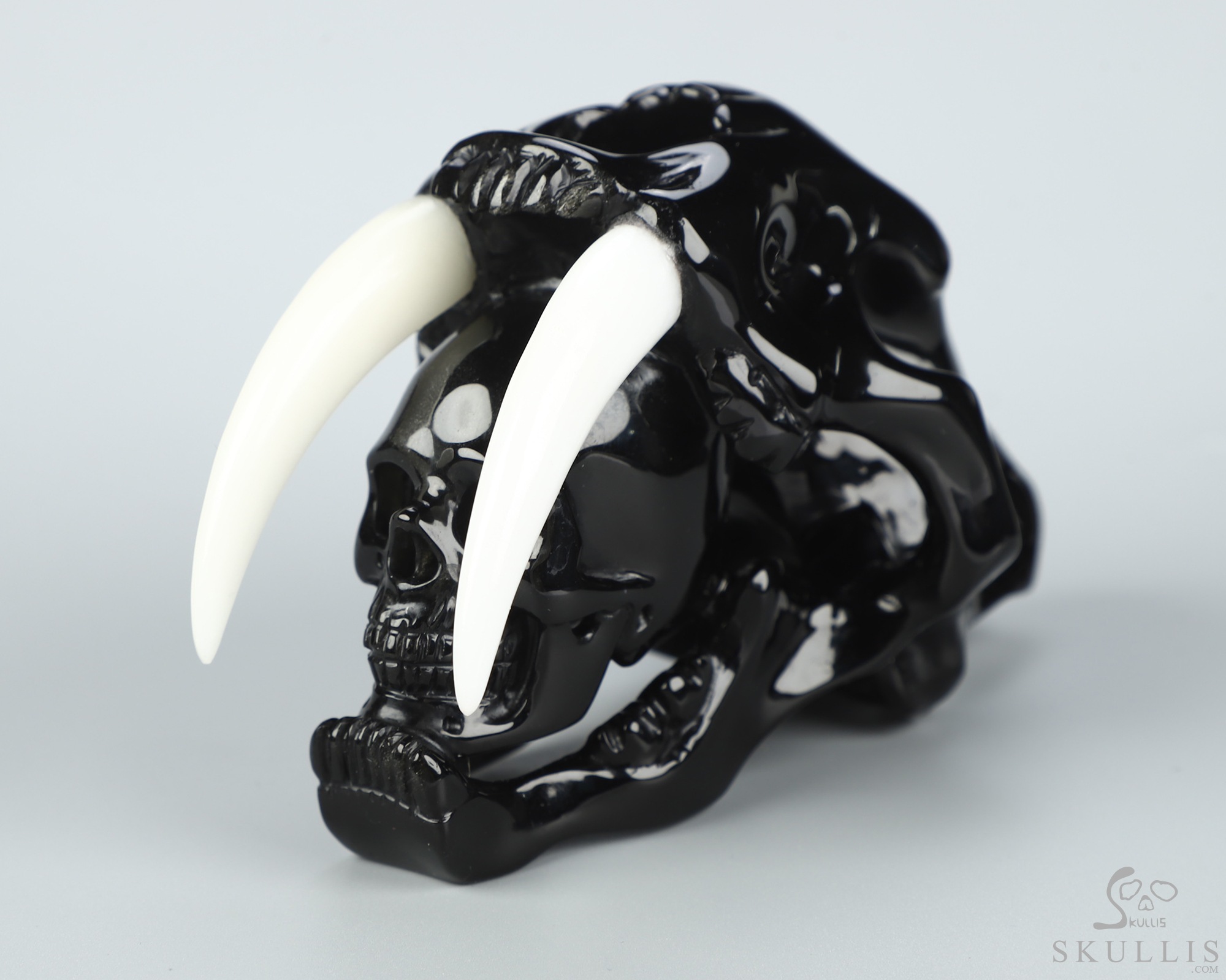 5.1" Black Obsidian Hand Carved Crystal Smilodon SABER-TOOTHED Tiger/Cat Skull and White Jade Tooth Sculpture 5.1" Black Obsidian Hand Carved Crystal Smilodon SABER-TOOTHED Tiger/Cat Skull and White Jade Tooth Sculpture