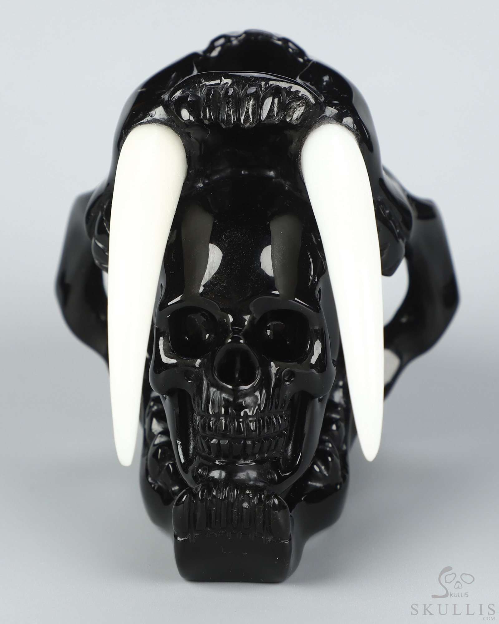 5.1" Black Obsidian Hand Carved Crystal Smilodon SABER-TOOTHED Tiger/Cat Skull and White Jade Tooth Sculpture 5.1" Black Obsidian Hand Carved Crystal Smilodon SABER-TOOTHED Tiger/Cat Skull and White Jade Tooth Sculpture