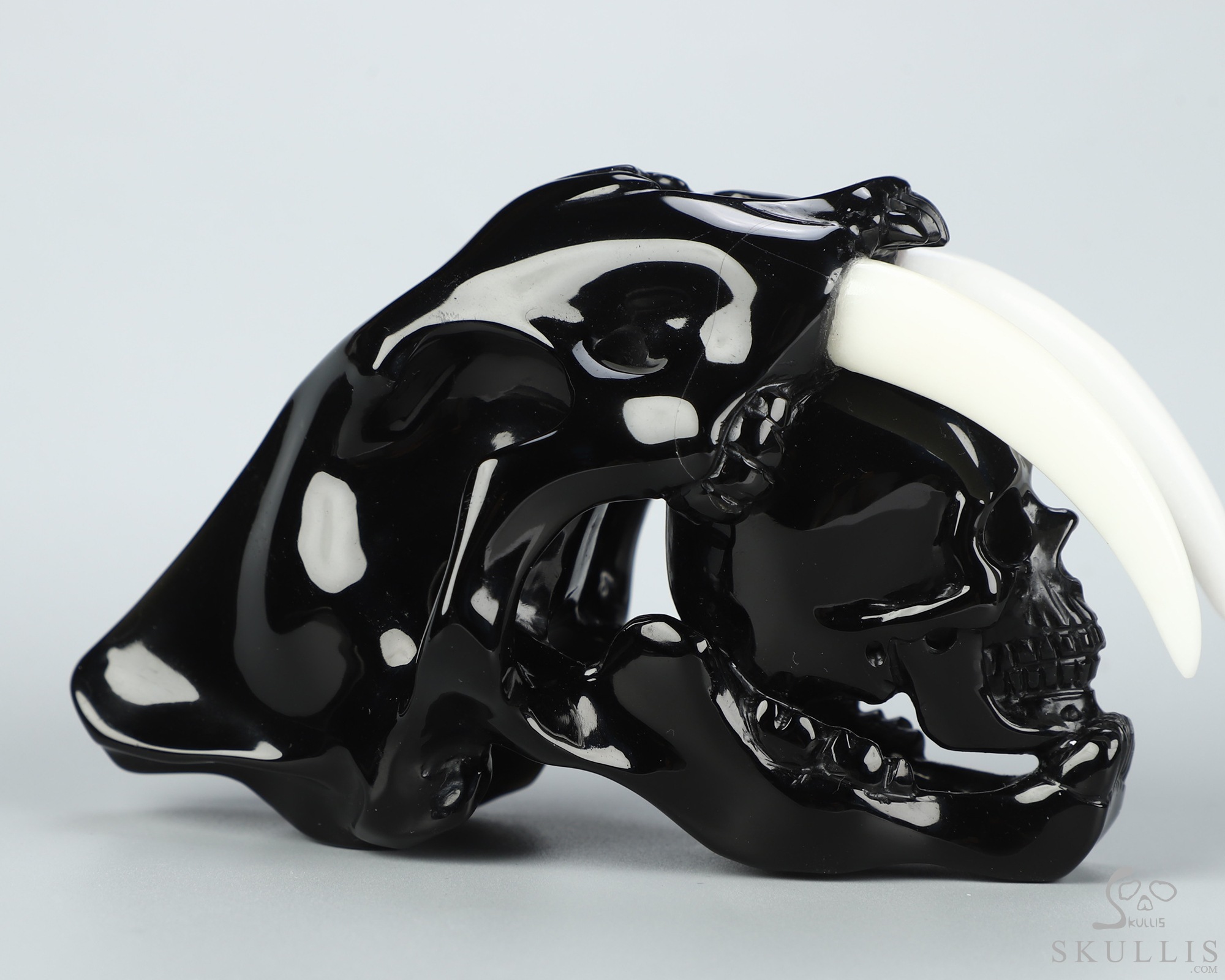 5.1" Black Obsidian Hand Carved Crystal Smilodon SABER-TOOTHED Tiger/Cat Skull and White Jade Tooth Sculpture 5.1" Black Obsidian Hand Carved Crystal Smilodon SABER-TOOTHED Tiger/Cat Skull and White Jade Tooth Sculpture