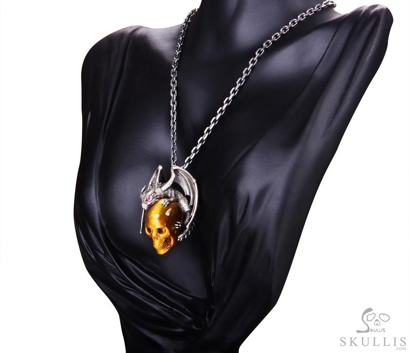 Crown of Ash and Bone - Necklace of Gold Tiger's Eye Hand Carved Crystal Skull with Ruby Eyes Dragon, Crystal Healing Skull Jewelry, for Women & Men Crown of Ash and Bone - Necklace of Gold Tiger's Eye Hand Carved Crystal Skull with Ruby Eyes Dragon, Crystal Healing Skull Jewelry, for Women & Men