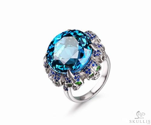 Circle of Fate - Blue Topaz with Sapphire and Tsavorite in 925 Sterling Silver Skulls Ring, Crystal Healing Skull Jewelry, for Women & Men Circle of Fate - Blue Topaz with Sapphire and Tsavorite in 925 Sterling Silver Skulls Ring, Crystal Healing Skull Jewelry, for Women & Men