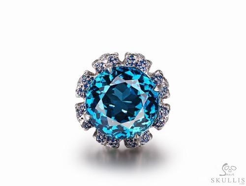 Circle of Fate - Blue Topaz with Sapphire and Tsavorite in 925 Sterling Silver Skulls Ring, Crystal Healing Skull Jewelry, for Women & Men Circle of Fate - Blue Topaz with Sapphire and Tsavorite in 925 Sterling Silver Skulls Ring, Crystal Healing Skull Jewelry, for Women & Men