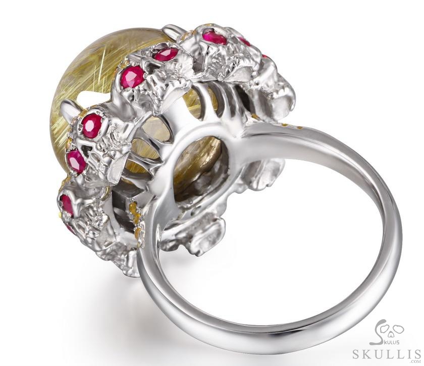 Circle of Fate - Gem Skull Ring of Rutilated Quartz Rock Crystal Hand Carved with Skull Ruby Eyes Skulls in 925 Sterling Silver, Crystal Healing Skull Jewelry, for Women & Men Circle of Fate - Gem Skull Ring of Rutilated Quartz Rock Crystal Hand Carved with Skull Ruby Eyes Skulls in 925 Sterling Silver, Crystal Healing Skull Jewelry, for Women & Men