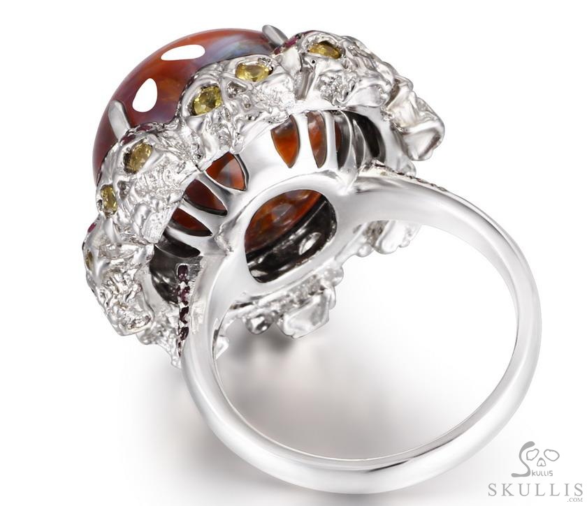 Circle of Fate - Gem Skull Ring of Red Pietersite Hand Carved with Ruby Eyes Skulls in 925 Sterling Silver, Crystal Healing Skull Jewelry, for Women & Men Circle of Fate - Gem Skull Ring of Red Pietersite Hand Carved with Ruby Eyes Skulls in 925 Sterling Silver, Crystal Healing Skull Jewelry, for Women & Men