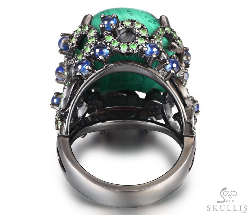 The Oasis Scroll - Malachite Hand Carved Crystal Skull Ring with Sapphire & Tsavorite, Crystal Healing Skull Jewelry, for Women & Men The Oasis Scroll - Malachite Hand Carved Crystal Skull Ring with Sapphire & Tsavorite, Crystal Healing Skull Jewelry, for Women & Men
