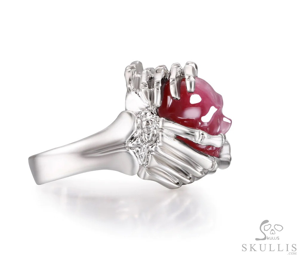 Embrace of Love - Gem Skull Ring of Ruby Hand Carved Crystal Skull with Skeletal Hands in 925 Sterling Silver, Crystal Healing Skull Jewelry, for Women & Men Embrace of Love - Gem Skull Ring of Ruby Hand Carved Crystal Skull with Skeletal Hands in 925 Sterling Silver, Crystal Healing Skull Jewelry, for Women & Men