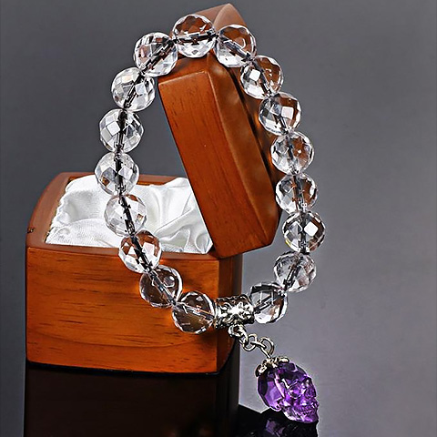 Faceted Natural Quartz Rock Crystal Beads Stretch Bracelet with Stunning Hand-Carved Amethyst Skull