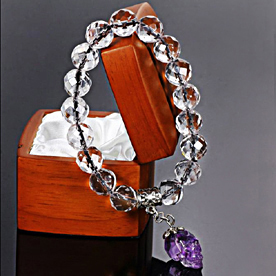 Faceted Quartz Rock Crystal Carved Beads And Amethyst Skull Bracelet