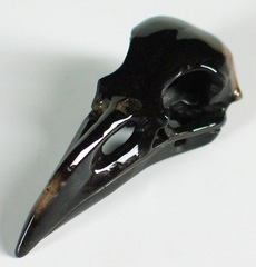 Black Onyx Carved Crystal Raven Skull Pendant
