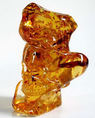A RARE COLLECTION, Colombian Amber Carved Crystal Skull, CLEAR, with Many Insects Inclusion