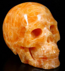 2.6" Orange Calcite Carved Crystal Skull, Realistic