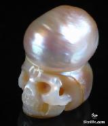 UNUSUAL, 0.7" Pearl Carved Crystal Skull, Realistic