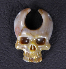 Petrified Wood Carved Crystal Skull Pendant