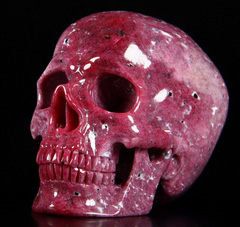 Ruby - Ruby Carved Crystal Skull Sculpture