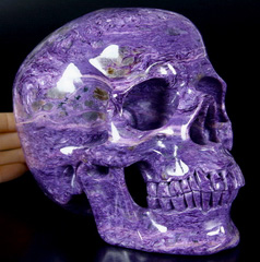 Ocharovaniye - Russian Charoite Lifesized Carved Crystal Skull Sculpture