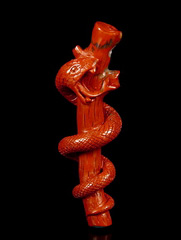 Red Jasper Carved Crystal Skull Pendant with Snake