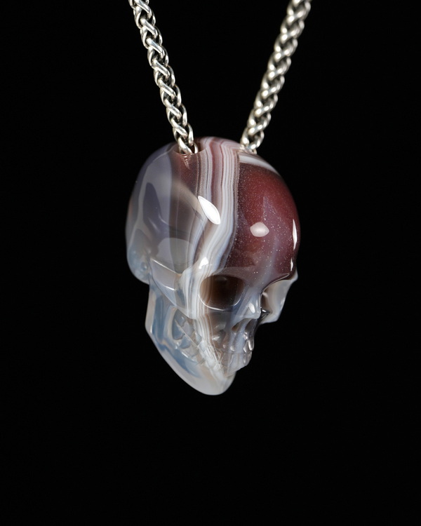 Hollow Essence - 1.4" Mozambique Agate Hand Carved Crystal Skull Pendant, Crystal Healing Skull Jewelry, for Women & Men