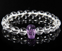 Quartz Rock Crystal Beads Stretch Bracelet with Stunning Hand-Carved Amethyst Skull