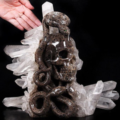 Dec 23, 2014 ACSAD (A Crystal Skull a Day) - Knowledge, Wisdom, and Enlightenment - Quartz Rock Crystal Druse Carved Crystal Skull with Snakes with Green Garnet Eyes and 92.5 Silver Tongues Sculpture